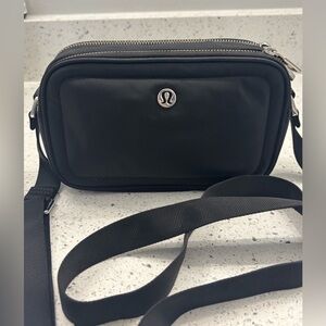 Lululemon black nylon crossbody, great condition.